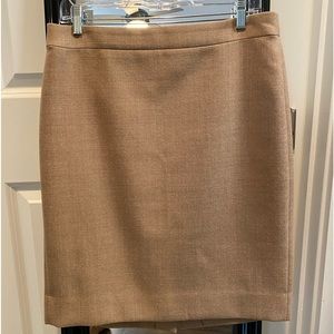 J Crew camel wool pencil skirt. size 10P. zipper in back with kick pleat